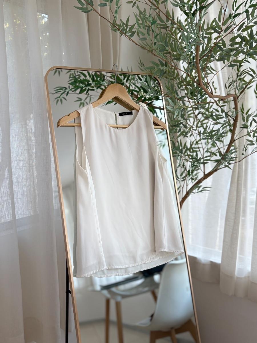 01.99 de blusa sin mangas blanco eneache .JPG